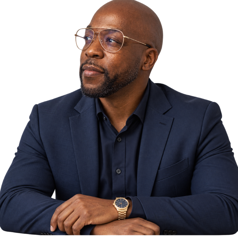Renel Chantes Domond, seated, looking away